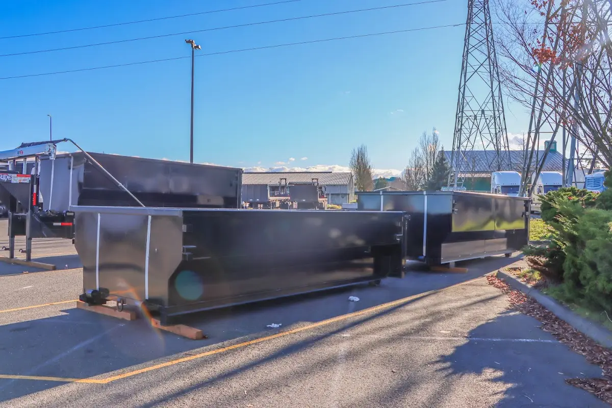 Roll-off dumpster ready for waste disposal at job site for 2 Yard Dumpster Rental in Bolivar